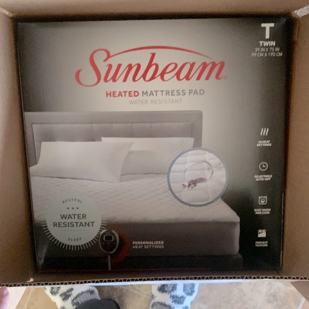 Heated mattress pad for twin bed, brand new. Never used.
